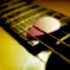an electric guitar in yellow and brown AlexP AV cl IM 70x70 - Bossa Nova