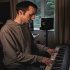 a man playing the piano, with musical instruments around him AlCreations AV IM 70x70 - Inspiring Nature Documentary Track